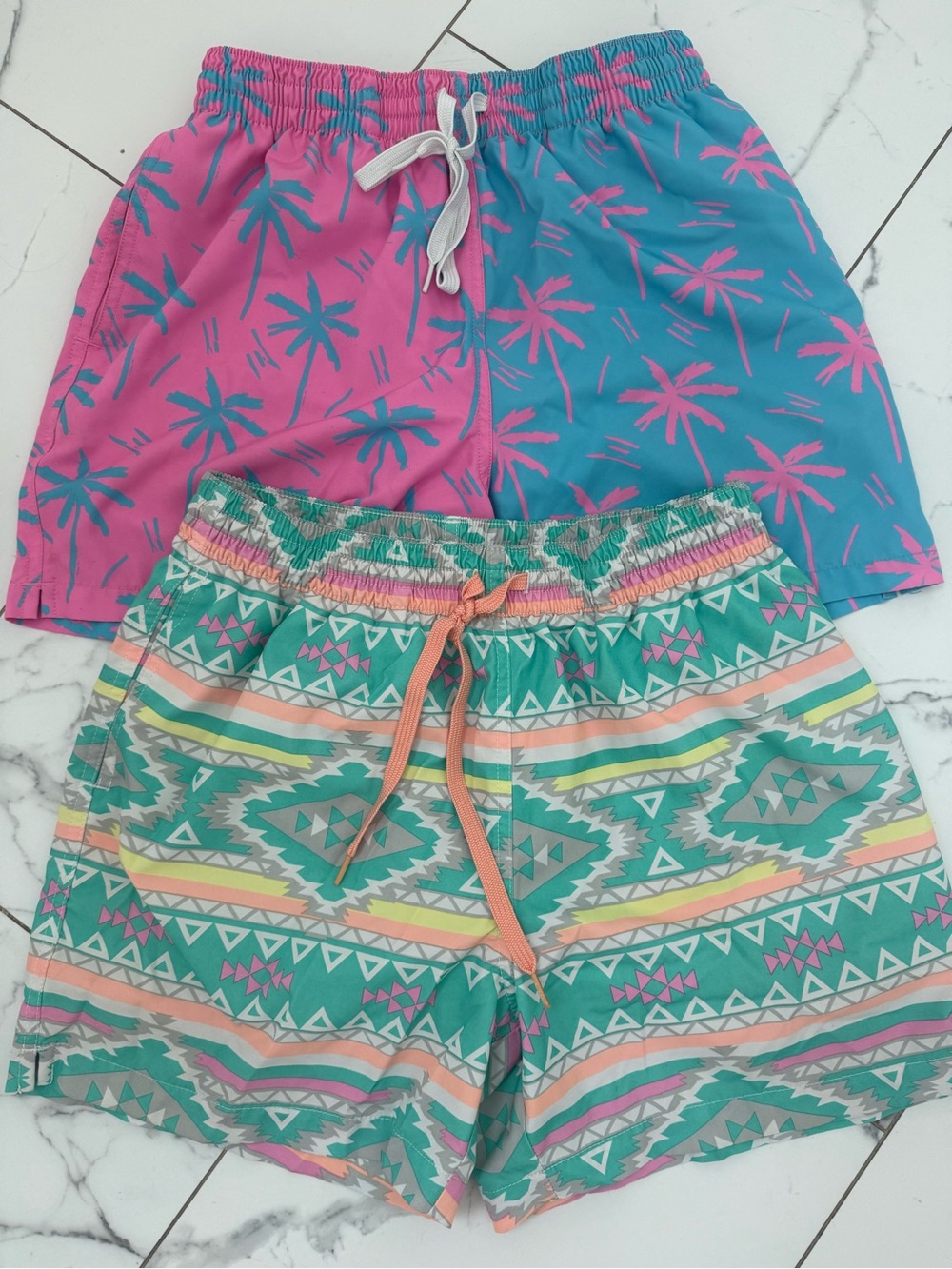 Chubbies 2 pairs  5.5” size medium swim trunks